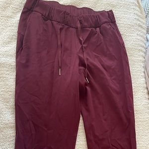 lululemon burgundy high rise stretch pants 7/8 length